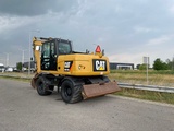 Minituur van Caterpillar M313D - CE