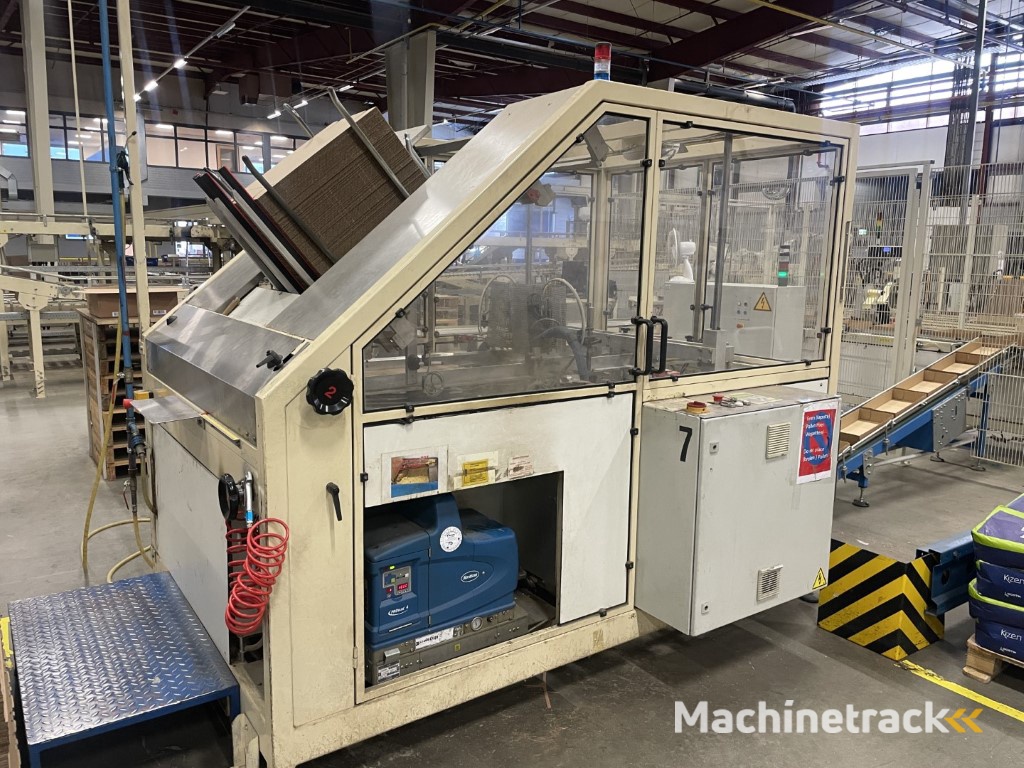 Sealed Air B+ BA20 dozenopzetmachine met stickermachine, elevator en verzamelband