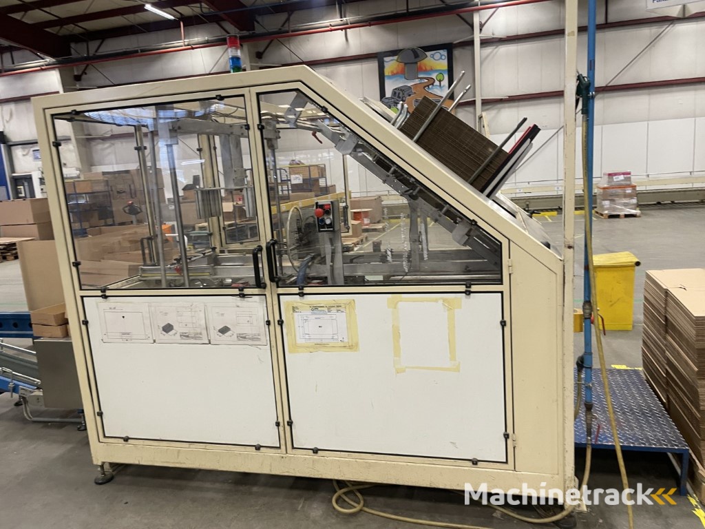 Sealed Air B+ BA20 dozenopzetmachine met stickermachine, elevator en verzamelband