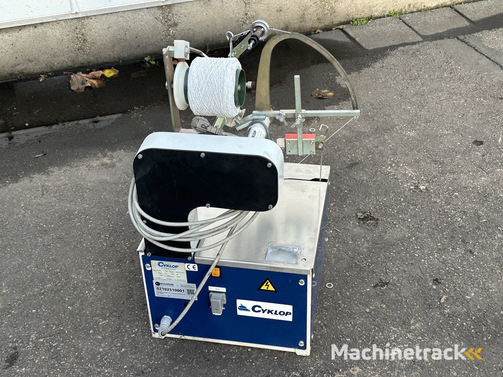 Cyklop Axro Mini TS R binding machine