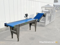 christiaens-invoerband-met-elevator-voor-kommkommersealer