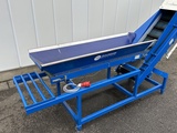 Minituur van S&B opvoerband 430 x 30 cm met doseerband 160 x 30 cm