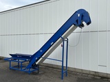 Minituur van S&B opvoerband 430 x 30 cm met doseerband 160 x 30 cm