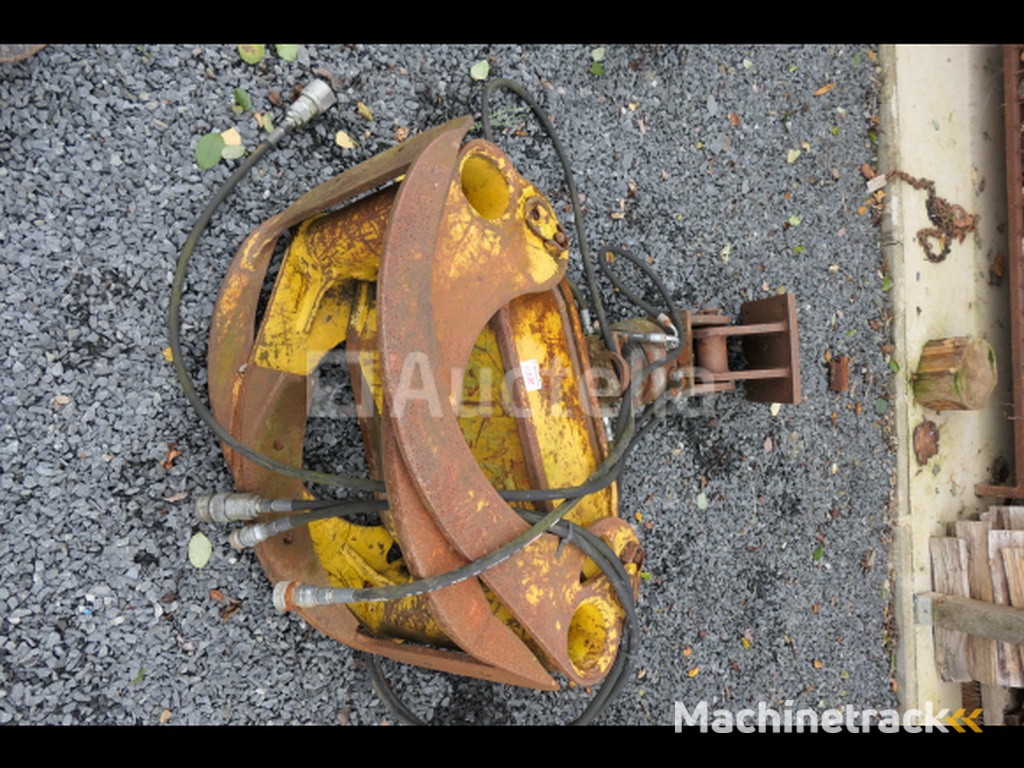 Rotary head wood grapple