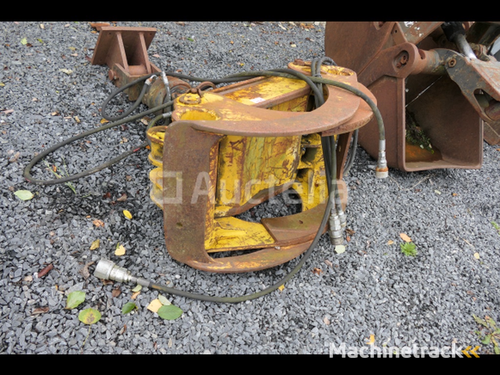 Rotary head wood grapple