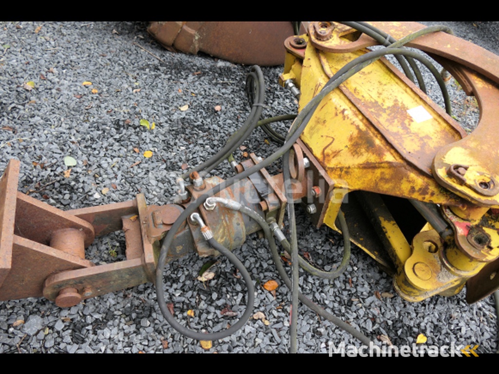 Rotary head wood grapple