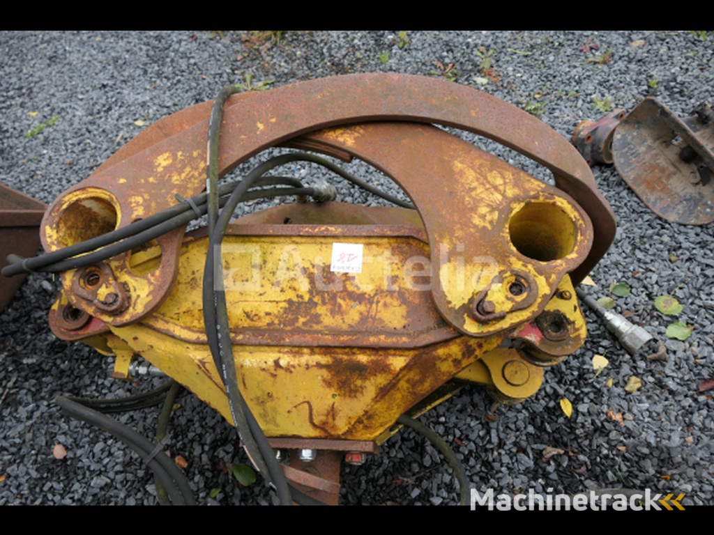 Rotary head wood grapple