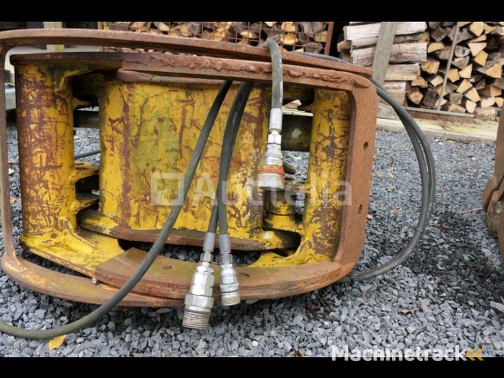 Rotary head wood grapple