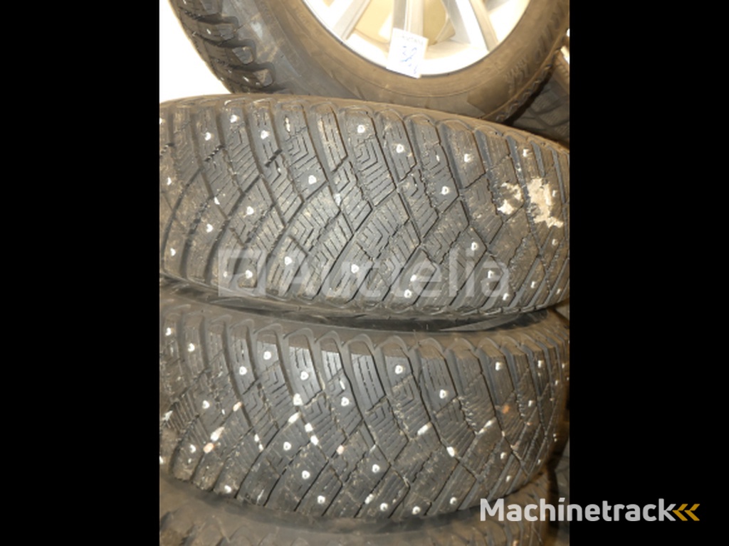 4 spijkerbanden op Goodyear Ultragrip IceArctic aluminium velgen - 195/65 R15