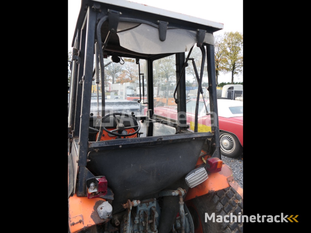 Tractor voor deze tuin + cirkelmaaier Kubota 245DT ( VIN: 245DT72778)