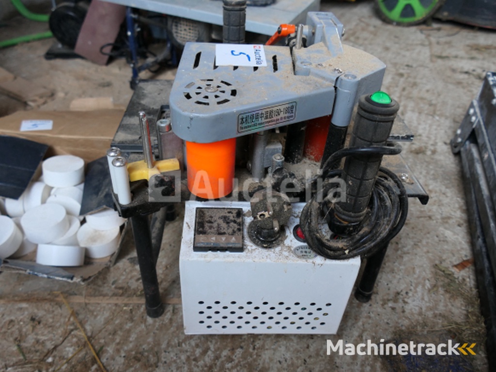 Draagbare kantenaanlijmmachine