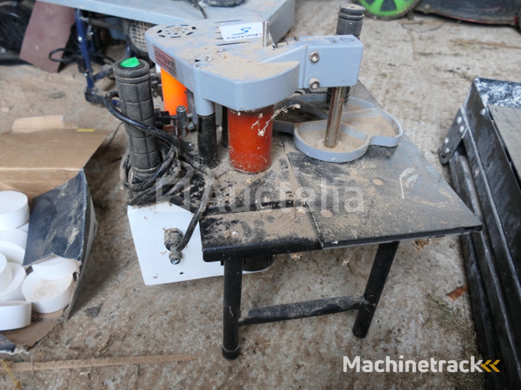 Draagbare kantenaanlijmmachine