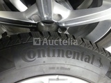 Minituur van 4 Winterbanden op aluminium velgen Continental VikingContact7 - 215/65 R17
