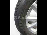Minituur van 4 spijkerbanden op Goodyear Ultragrip IceArctic aluminium velgen - 195/65 R15