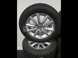 Minituur van 4 spijkerbanden op Goodyear Ultragrip IceArctic aluminium velgen - 195/65 R15