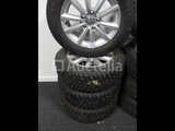 Minituur van 4 spijkerbanden op Goodyear Ultragrip IceArctic aluminium velgen - 195/65 R15