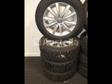 Minituur van 4 spijkerbanden op Goodyear Ultragrip IceArctic aluminium velgen - 195/65 R15