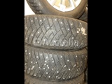 Minituur van 4 spijkerbanden op Goodyear Ultragrip IceArctic aluminium velgen - 195/65 R15