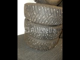 Minituur van 4 spijkerbanden op Goodyear Ultragrip IceArctic aluminium velgen - 195/65 R15