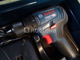 Miniaturansicht von BOSCH GSR 18V-55 cordless drill driver in its systainer
