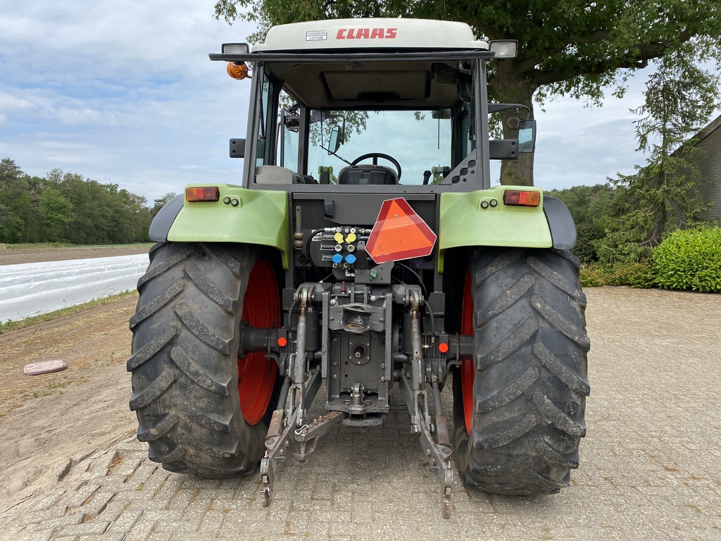 Claas Celtis 456 RX met frontlader