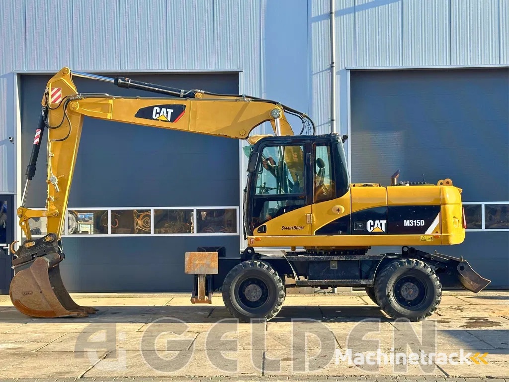 Caterpillar M315D - BLADE+OUTRIGGERS