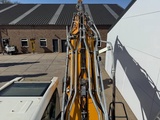Minituur van Liebherr R926NLC-Oilquick-Tilting-Bucket-German-Machine