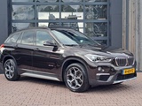 Minituur van BMW X1 sDrive18i High Executive | Automaat | Leder | Pano | Trekhaak | Cruise | PDC | All-seasons |