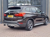 Minituur van BMW X1 sDrive18i High Executive | Automaat | Leder | Pano | Trekhaak | Cruise | PDC | All-seasons |