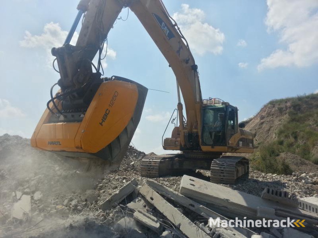 One-TP Godet concasseur Hartl pour pelle 11 à 55 tonnes