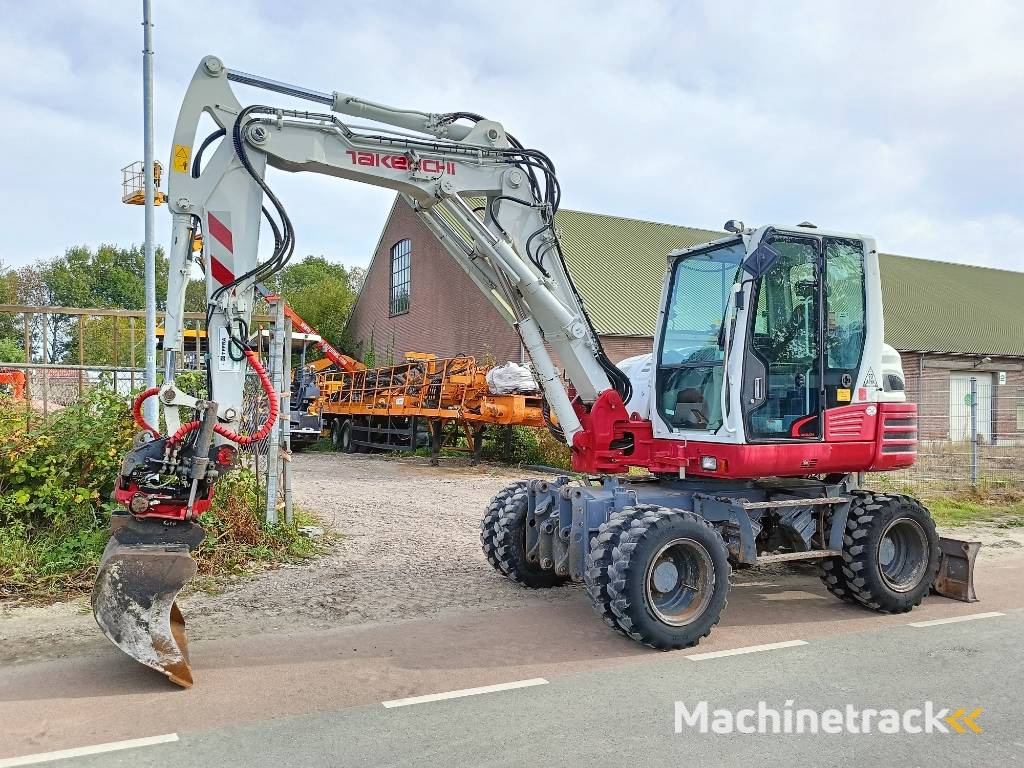 Takeuchi TB 295 W mobiele graafmachine mobile excavator