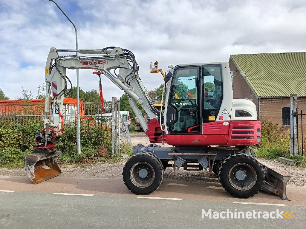 Takeuchi TB 295 W mobiele graafmachine mobile excavator
