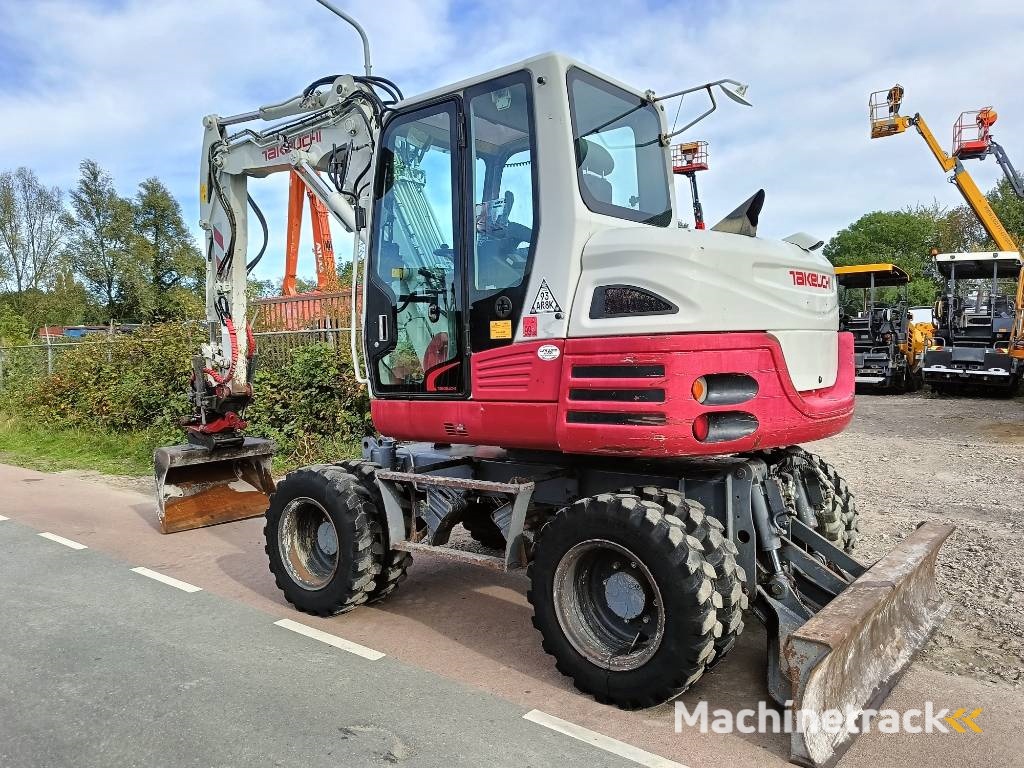 Takeuchi TB 295 W mobiele graafmachine mobile excavator