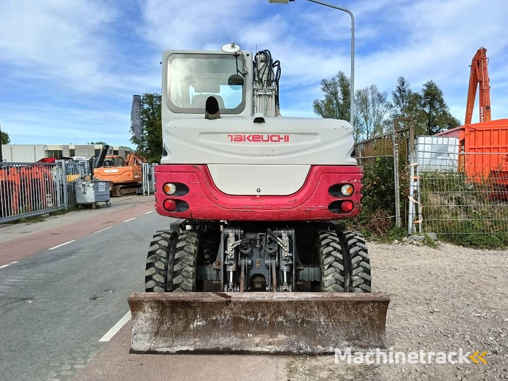 Takeuchi TB 295 W mobiele graafmachine mobile excavator