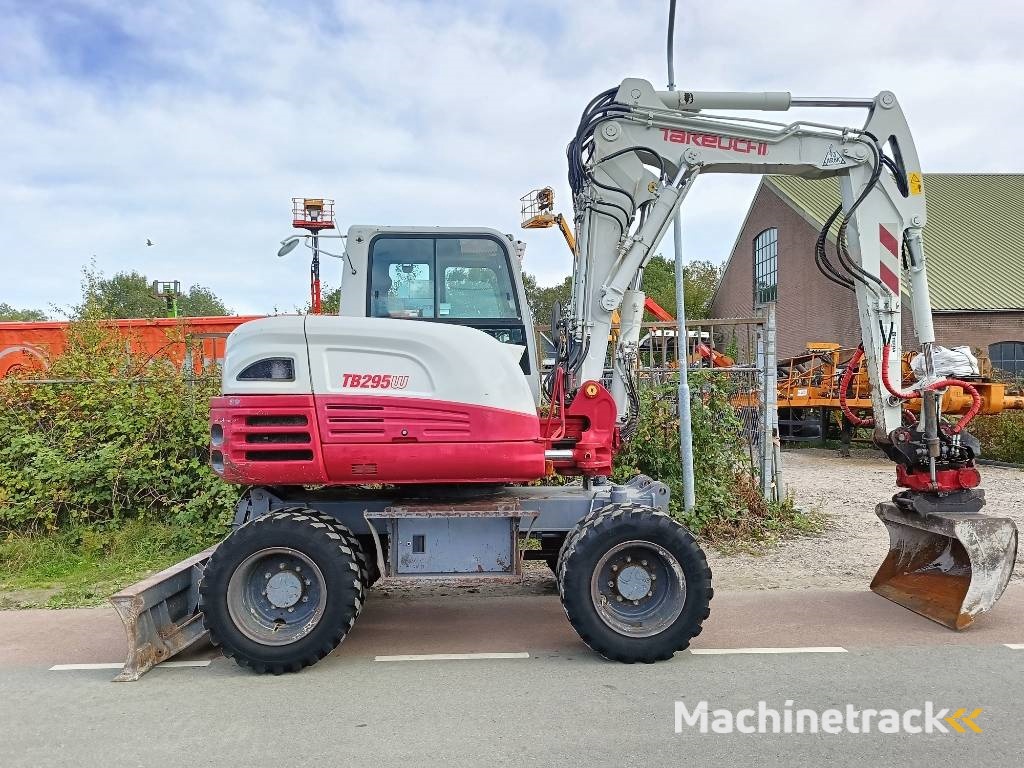 Takeuchi TB 295 W mobiele graafmachine mobile excavator