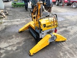 Minituur van Brokk 90 husqvarna robot remote excavator digger