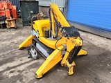 Minituur van Brokk 90 husqvarna robot remote excavator digger