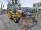 Minituur van Volvo BL 61 + graaflaad combinatie backhoe loader lader