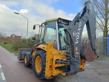 Minituur van Volvo BL 61 + graaflaad combinatie backhoe loader lader