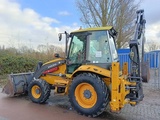 Minituur van Volvo BL 61 + graaflaad combinatie backhoe loader lader