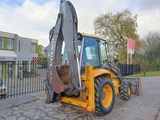 Minituur van Volvo BL 61 + graaflaad combinatie backhoe loader lader