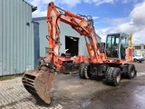 Minituur van Fiat-Hitachi FH120W bandenkraan Wheel Excavator graafmachine