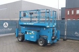 Minituur van Schaarhoogwerker Genie GS-4069 RT Diesel 14.12m