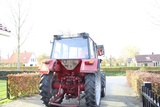 Minituur van International 844SA met voorlader