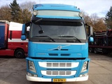 Minituur van Volvo FM 380 globetrotter bakwagen schuizeil/schuifdak