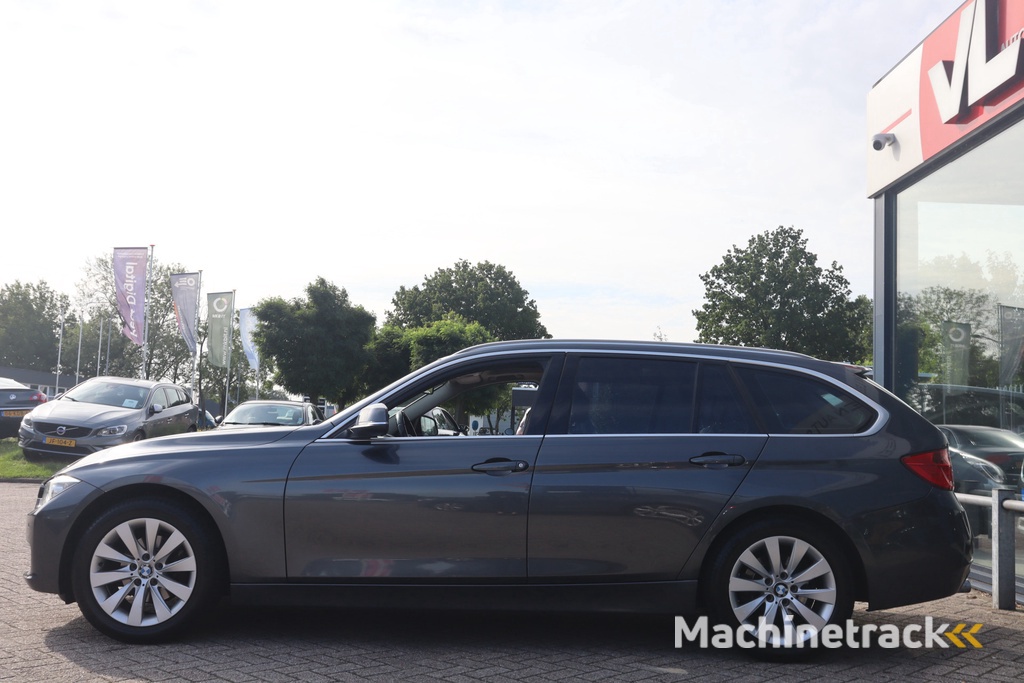 BMW 3-serie Touring 318d High Executive | Pano | Stoelverwarming | Automaat