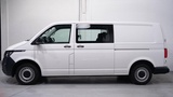 Minituur van Volkswagen Transporter 2.0 TDI 110 pk L2 Dubbel Cabine 2x Schuifdeur NAP, Trekhaak, Airco, Cruise Control, 5-Zits, 1e Eigenaar