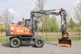 Minituur van Atlas 160W | ROTOTILT | GRIPPER | BUCKET | DOZER BLADE