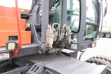 Minituur van Atlas 160W | ROTOTILT | GRIPPER | BUCKET | DOZER BLADE