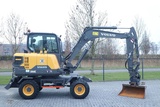 Minituur van Volvo EW60E | DEMO | 30 KM/H | ROTOTILT + GRIPPER | BUCKET